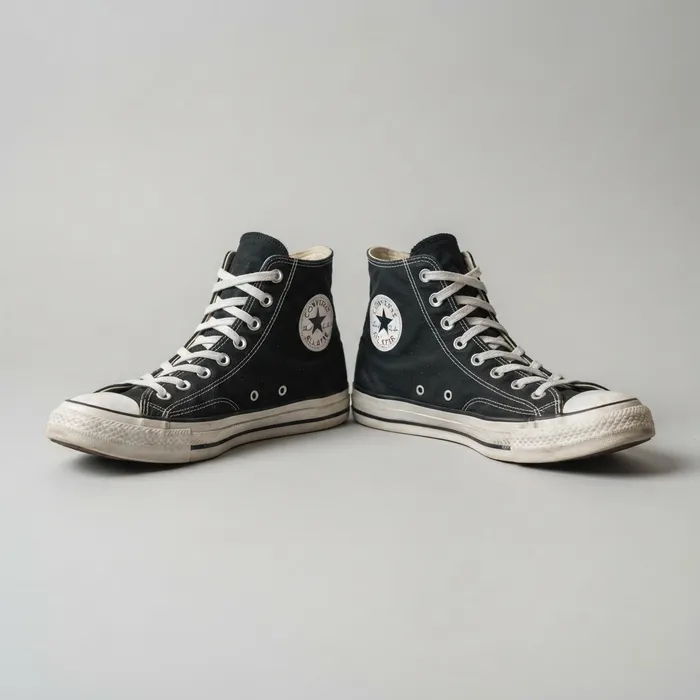 Black canvas high-top sneakers, gently worn